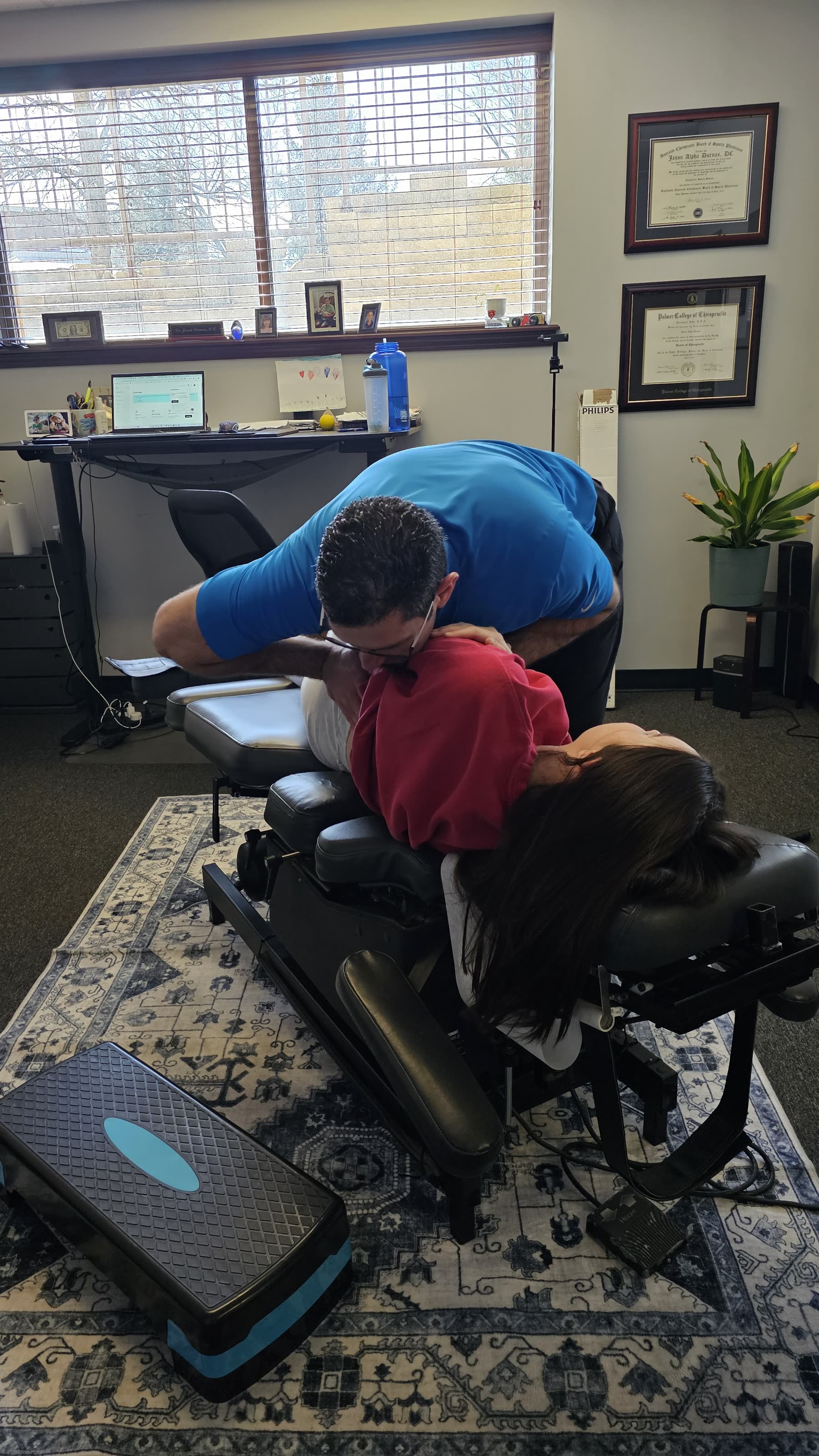 Dr. Durnas adjusting a patient on the drop table